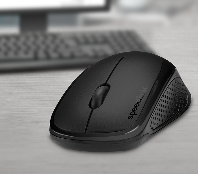 Schwarze kabellose Speedlink Computermaus mit ergonomischem Design auf einem hellen Schreibtisch, im Hintergrund eine Tastatur